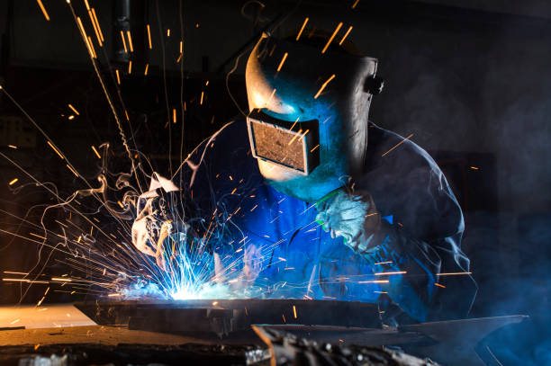 welding argon, results welding on the metal of the foreground